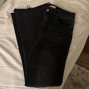 Women’s Black Flare Jeans with Distressed Bottom
